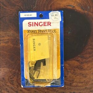 Singer, even feed foot.